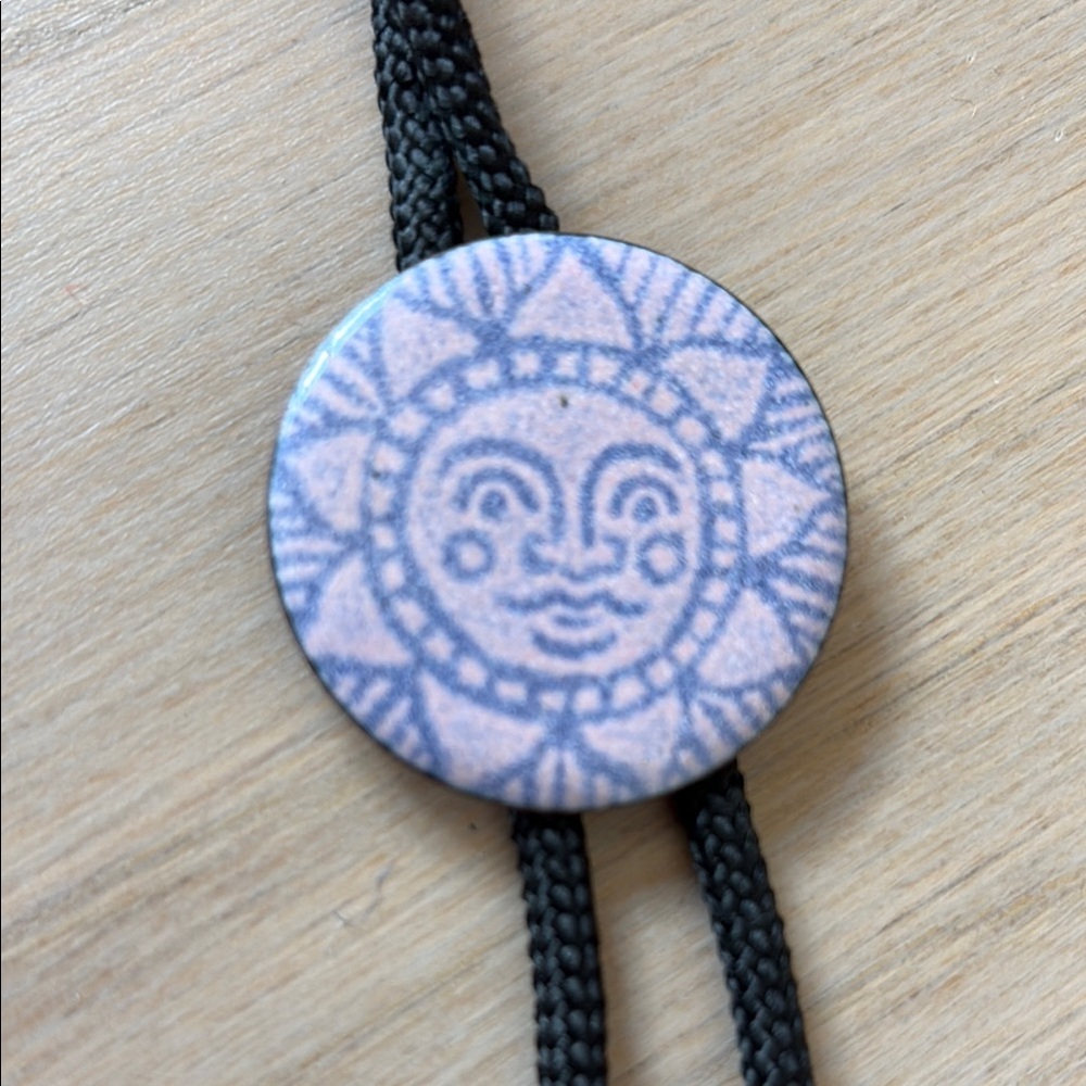 enamel on Copper Painted Bolo, vintage sunface, purple. Rare